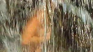 Kara Novak and Cheyenne Cooper have fun with a dildo outside