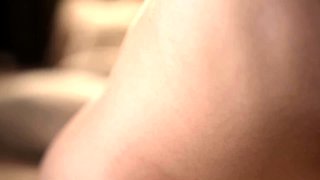 Busty curly brunette with big boobs fucks on couch
