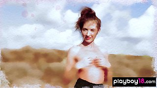 Sexy muse reveals her tits in the desert