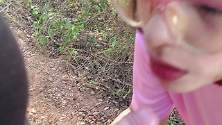 Latina teen gives a blowjob in the woods