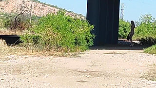Slave Tih Shows Her Pussy and Tits Under the Bridge