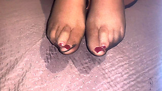 Feet in Pantyhose and Red Nail Polish for a Super Cumshot