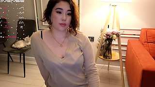 Amateur redhead Jacqueline with glasses masturbates