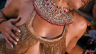 In the moonlit waters' embrace, Jasmine Sherni awakens sensual passions with graceful allure.