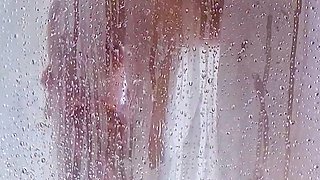 Watch her butt and bounce her curves in this explicit shower, 18+ only video