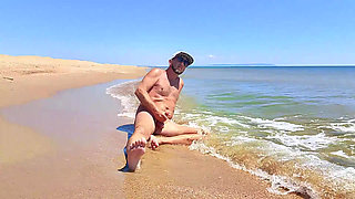 Nudist Couple Having Pegging Session on the Beach
