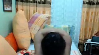 Filipina Granny with Glasses Shows Her Tits on Webcam