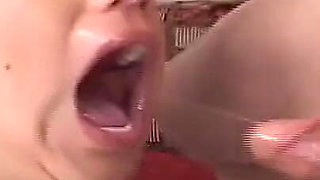 Two Cocks in Her Throat and She Swallows Like a Candy