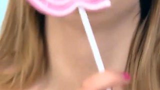 Marvelous blonde with perfect body touches her cunt with sweet candy