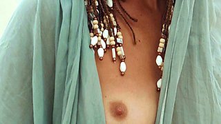 Petite Australian MILF strips at a beach