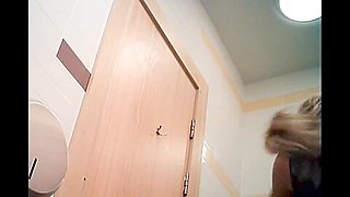 Blonde shows booty upskirt and gets spied pissing on toilet