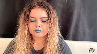 Exotic Goddess with Wild Hair Blows Smoke for You