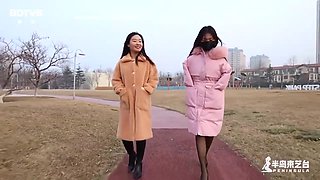 Two Chinese Girls Outside