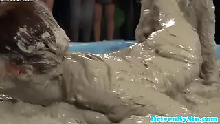 European hotties enjoy wrestling in mud