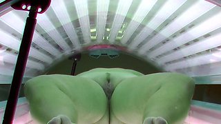Busty and husky housewife in solarium
