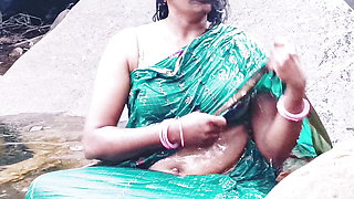 Telugu sexy Silk aunty outdoor waterfall bathing, telugu Dirty talks.