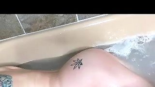 Hot babe with perfect big boobs taking shower