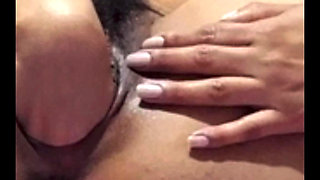 Latina Sticks Her Fist in Her Pussy
