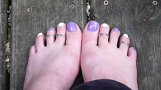 Purple and White Toes Wiggling Wearing Toe Rings