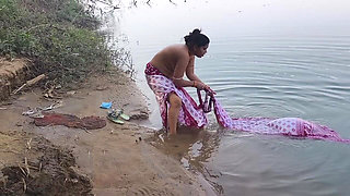 Indian Village Wife Bathing in the River in Outdoor Area