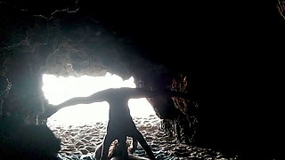 Couple recorded at the beach, inside the cave