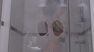 A Slut Dildos Herself During Her Shower, Comes to Watch on Her Through the Transparent Glass Window