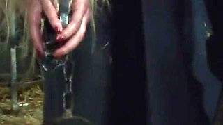 Witch Hangs Upside Down and Gets Drizzled with Black Wax