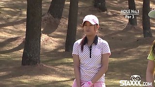 Asian golfer gets pounded on the green!