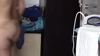 Amateur Wife Dancing Naked at Home. Amateur Woman Has Fun Trying on Clothes and Cutting Them.