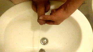 Peeing on My Hand, in a Sink
