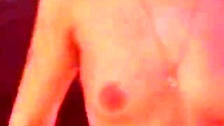 Blonde Stripper Bends Showing Shaved Pussy