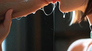 Black bob haired girl deepthroats cock in dim window room