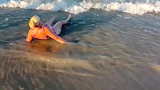 Try Not to Wet My Hair While Play with the Waves