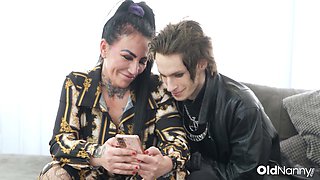 Tattooed Big-Titted Mature Sucks Emo Stud