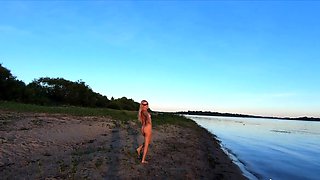 Russian Nudist on the River Shore