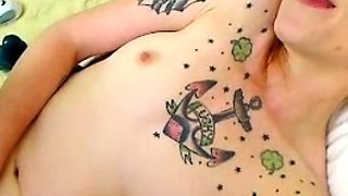 Small titted brunette Sharron with glasses masturbates