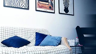 Cute amateur asian web cam girl playing with her toy