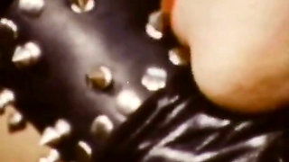Retro Mistress Trains Submissives with Whips and Vintage Dildos