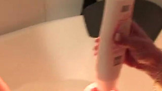 Three naughty matures are having fun in the bathroom