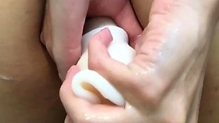 Oiled skinny teen fists her juicy ass on webcam solo.