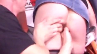 German mechanic men fists customer in the workshop