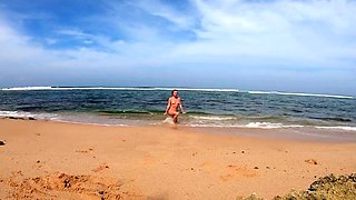 Blonde Babe's Naked Swim in the Ocean