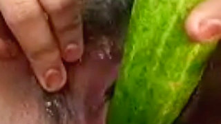 Teen college girl masterbating using cucumber