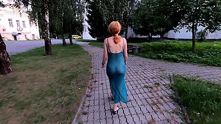 walks in a transparent dress