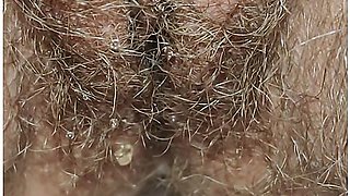 Best close-up of peeing on a thick, hairy pussy