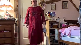 Dressed in a red evening gown for a party