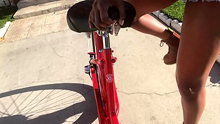 DEMI SUTRA rides a bike through her republican neighborhood