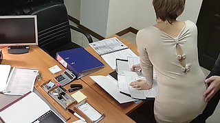 Hot office secretary sucks and rides her boss on the desk