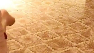 A Cute Little Dressed in a Jk Uniform Was Walking Around Barefoot on the Ground.