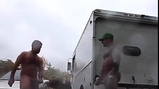 Public Rainy Stroking in a Parking Lot by Two Horny Men